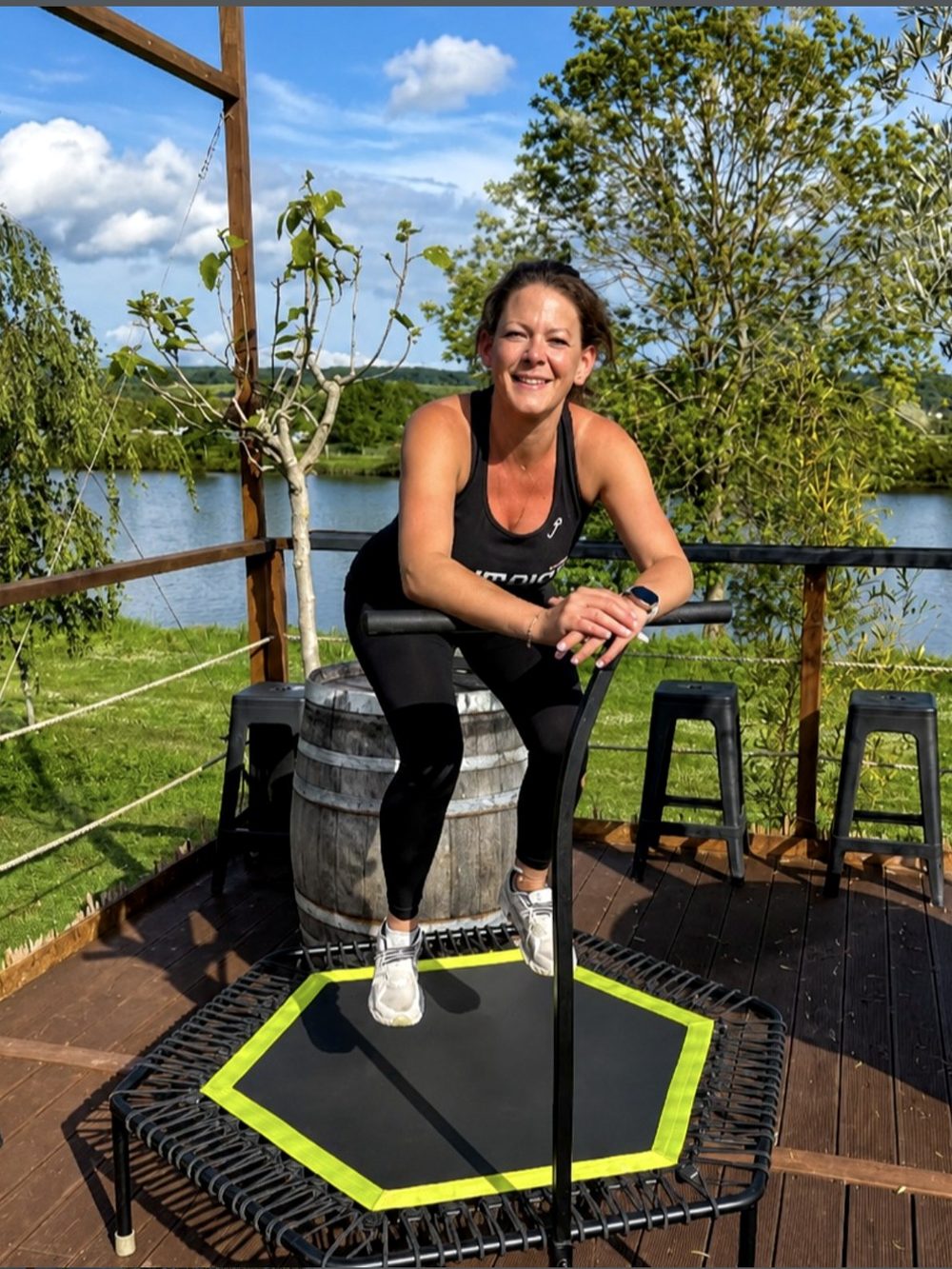Mandy on a hexagonal trampoline on the lakeside terrace